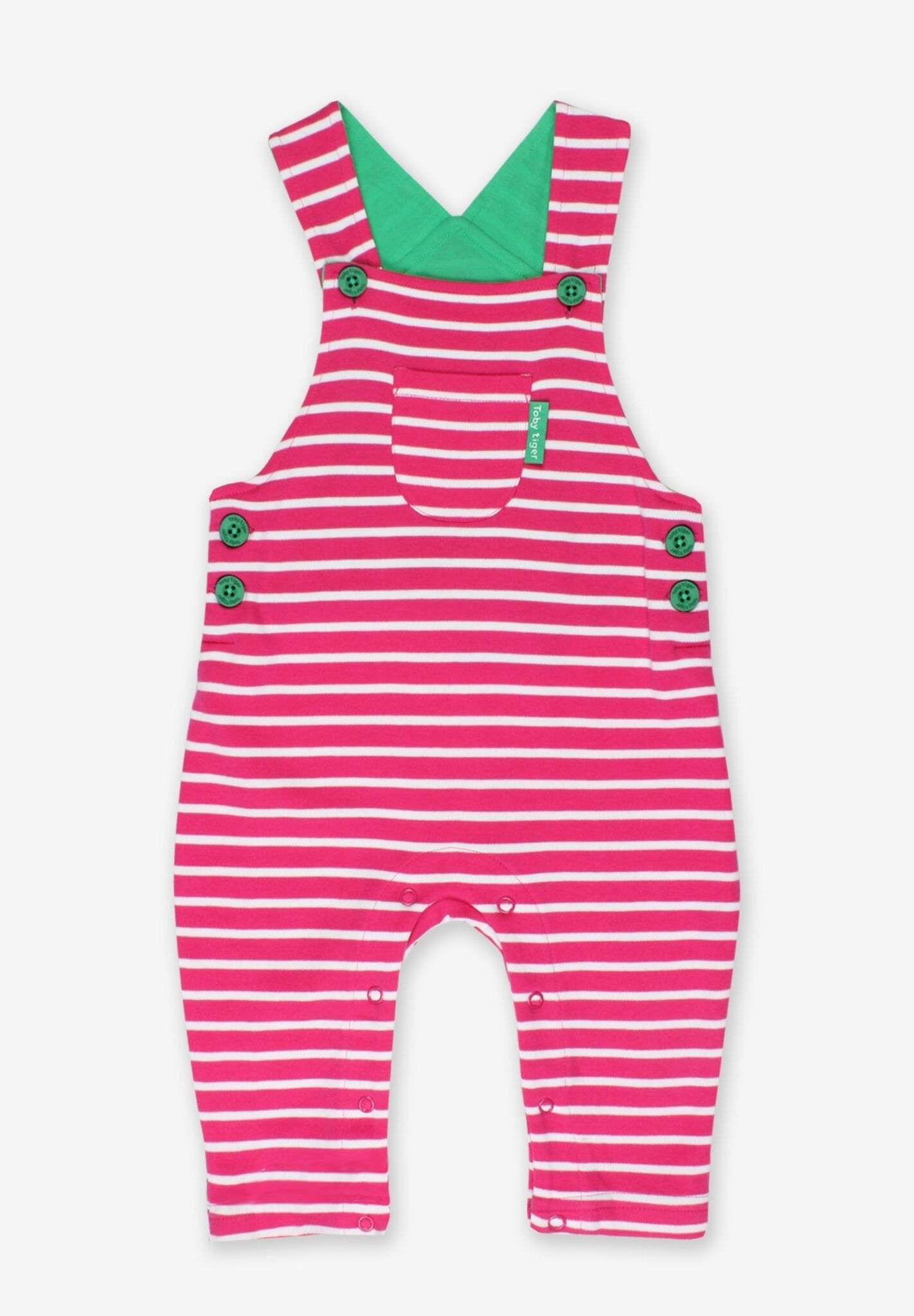 Premium organic cotton striped pinafore overalls, soft pink and white Breton style, adjustable straps, snap-button closure by Toby Tiger at brixbailey.com