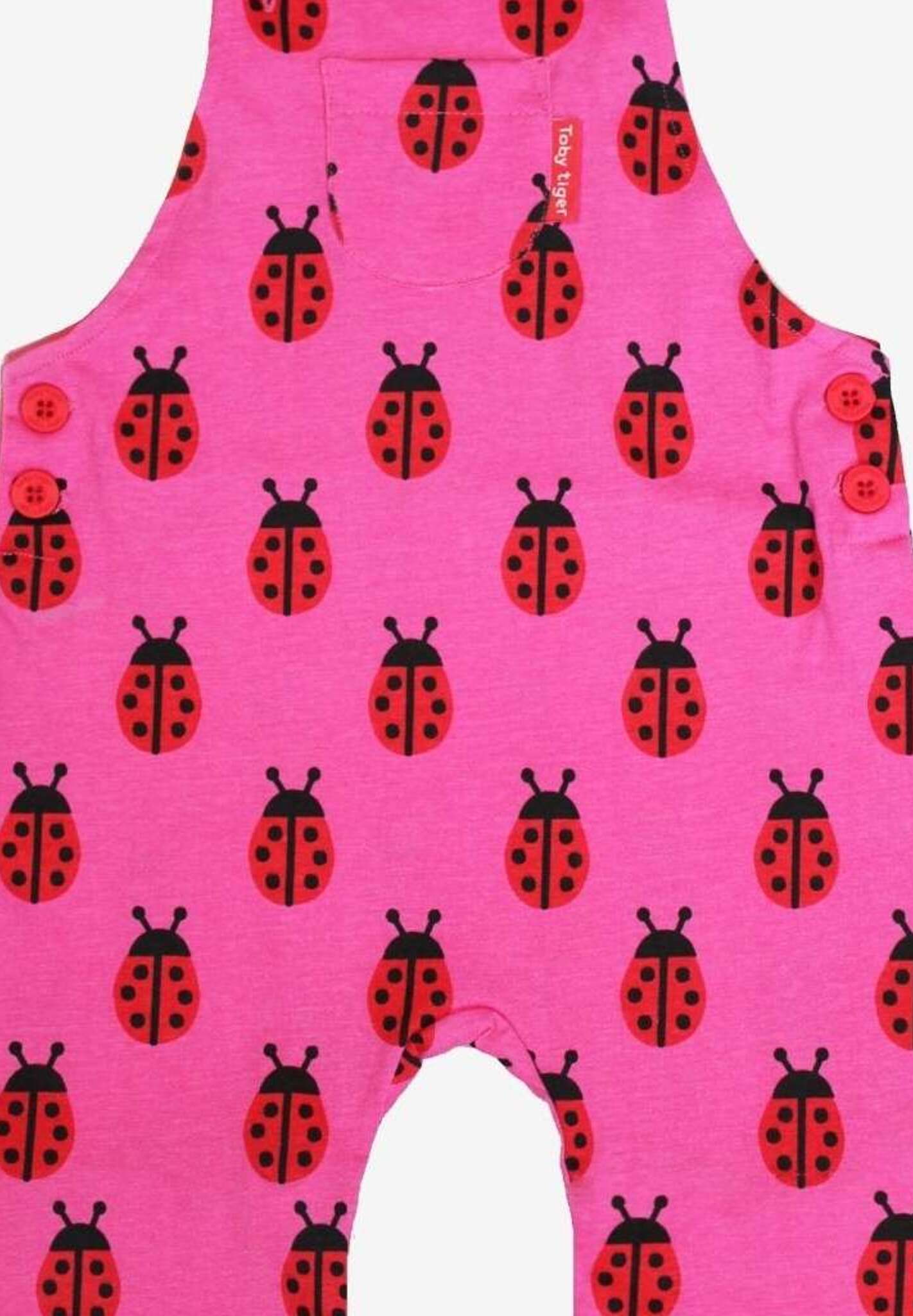 Baby Romper with Ladybug Print - Adjustable Organic Cotton Overalls for Easy Diaper Changes by Toby Tiger at brixbailey.com