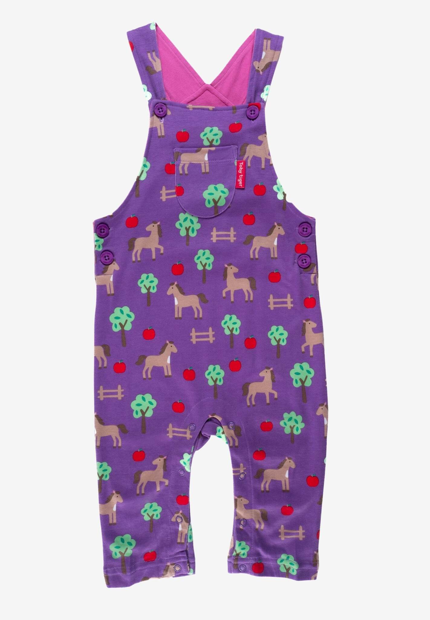 Premium organic cotton baby overall with horse and apple print, soft GOTS-certified fabric, adjustable straps, snap buttons for easy diaper change by Toby Tiger at brixbailey.com