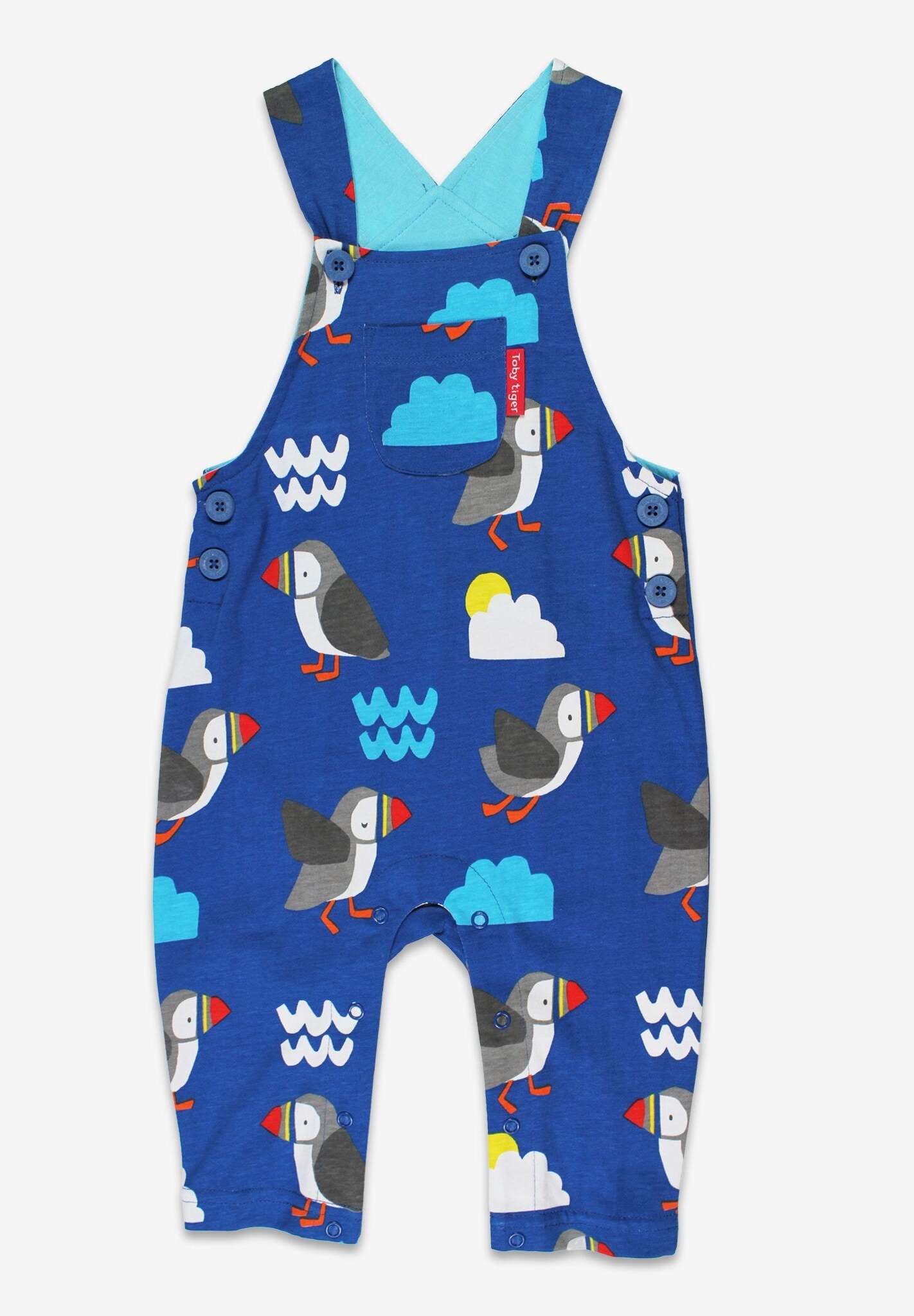 Luxury organic cotton baby overall with parrot diver print, stylish sun clouds waves design, adjustable straps, snap buttons, GOTS certified by Toby Tiger at brixbailey.com
