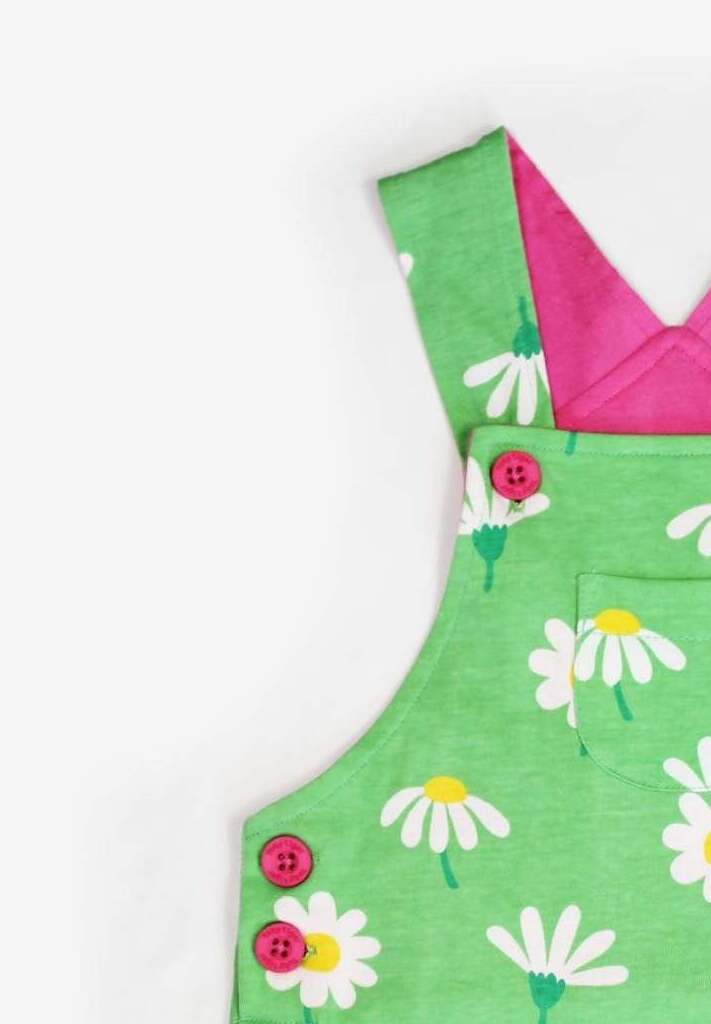 Luxury baby summer dungarees with daisy print, premium organic cotton shorts, stylish adjustable straps, best-selling floral romper by Toby Tiger at brixbailey.com