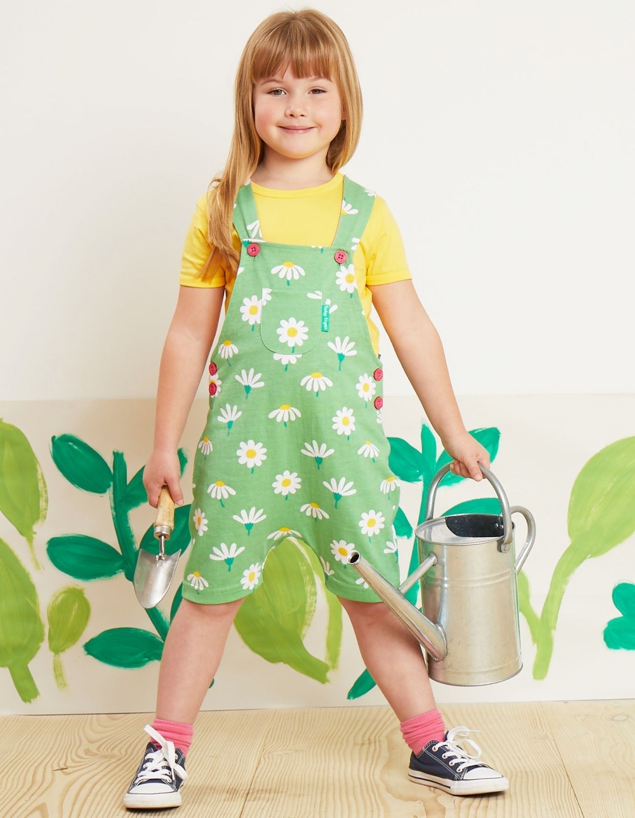 Luxury summer denim overalls with daisy print, stylish baby bloomer shorts, premium organic cotton, adjustable straps, snap buttons by Toby Tiger at brixbailey.com
