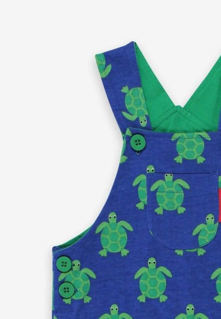 Premium green and blue turtle print pinafore overalls, adjustable straps, snap buttons, soft GOTS certified organic cotton, stylish kids summer wear by Toby Tiger at brixbailey.com