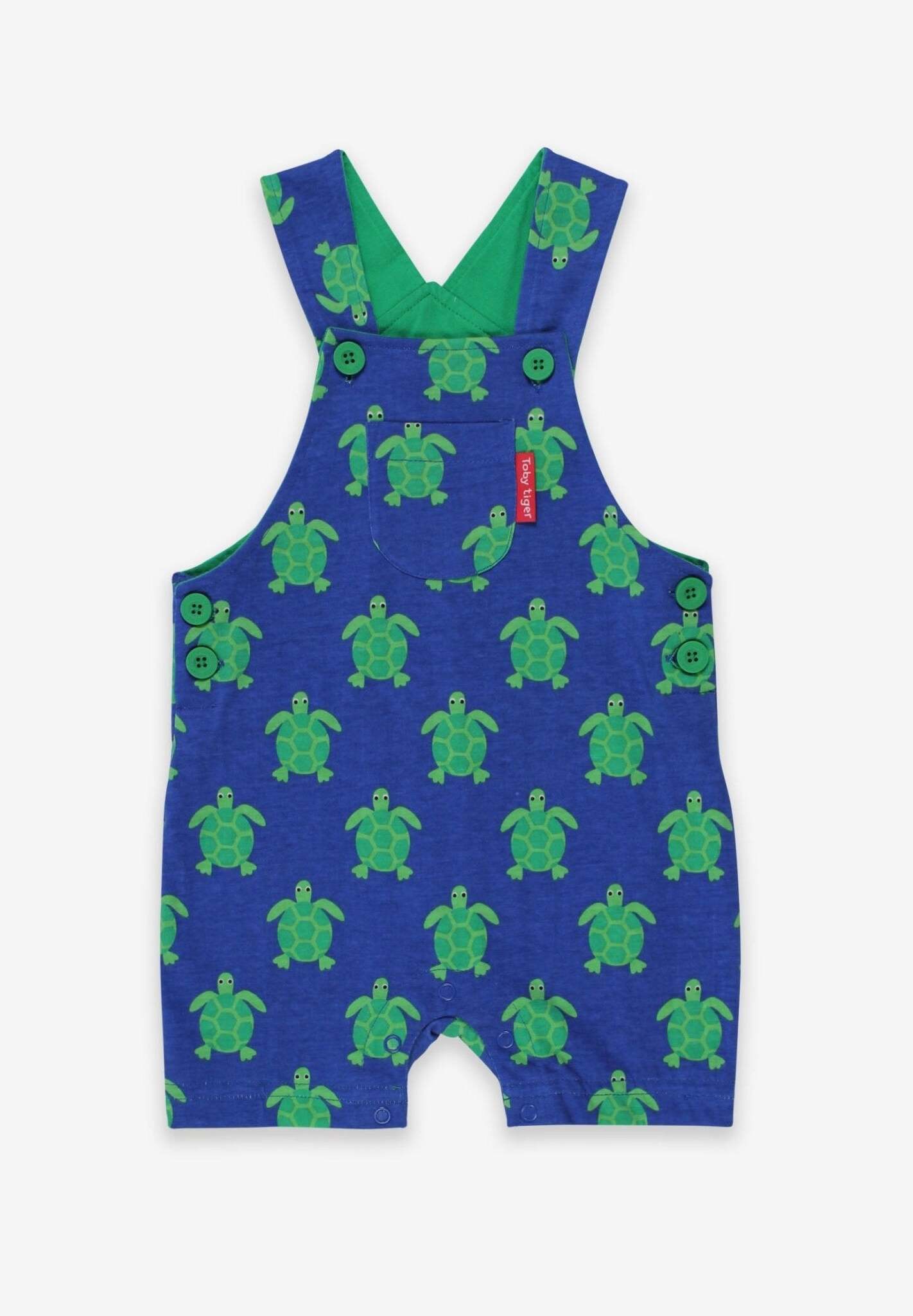 Premium green and blue turtle print bib overalls, adjustable straps, snap buttons, soft GOTS certified organic cotton, stylish and comfortable by Toby Tiger at brixbailey.com