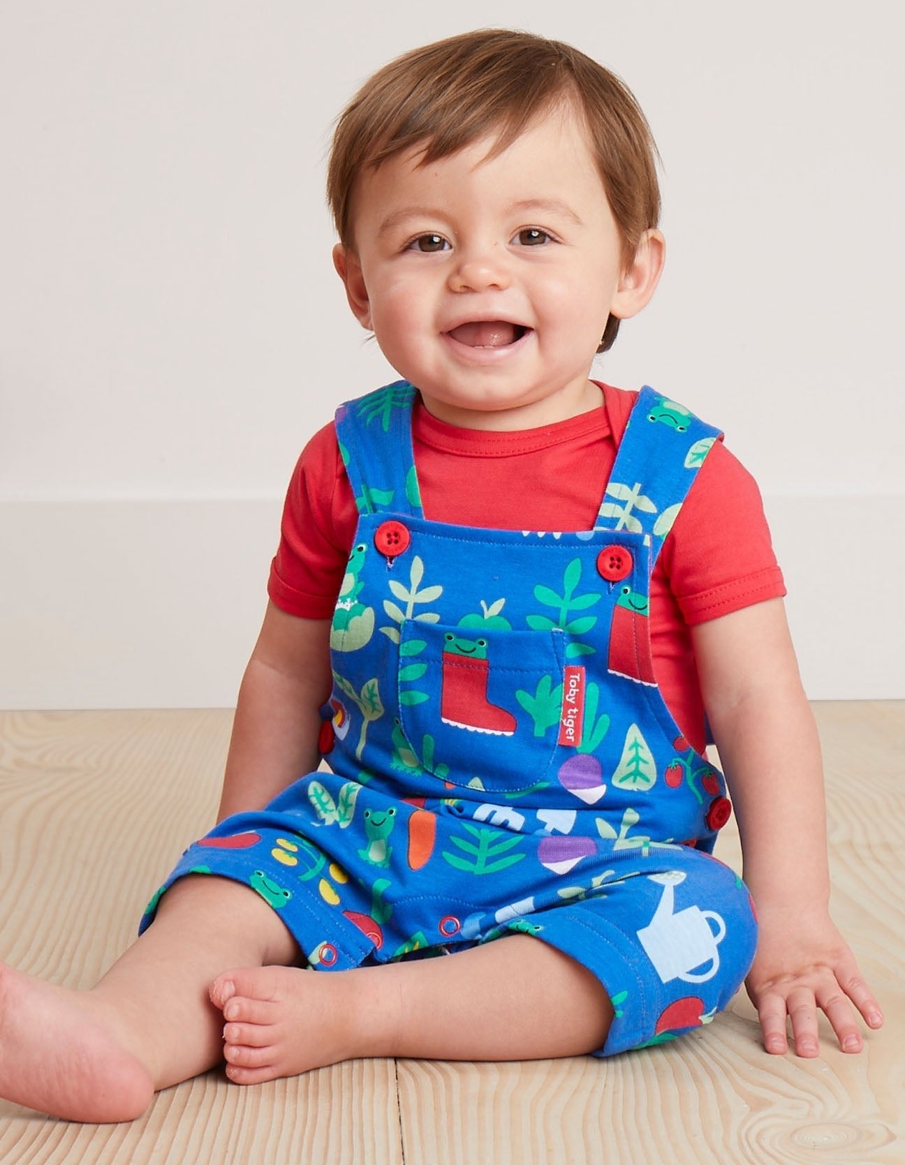 Sweet Little Gardeners in Adorable Organic Cotton Short Overalls with Adjustable Straps and Snap Buttons by Toby Tiger at brixbailey.com