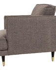 Luxurious grey fabric armchair with curved arms, modern design for elegant living room seating by sostter at brixbailey.com