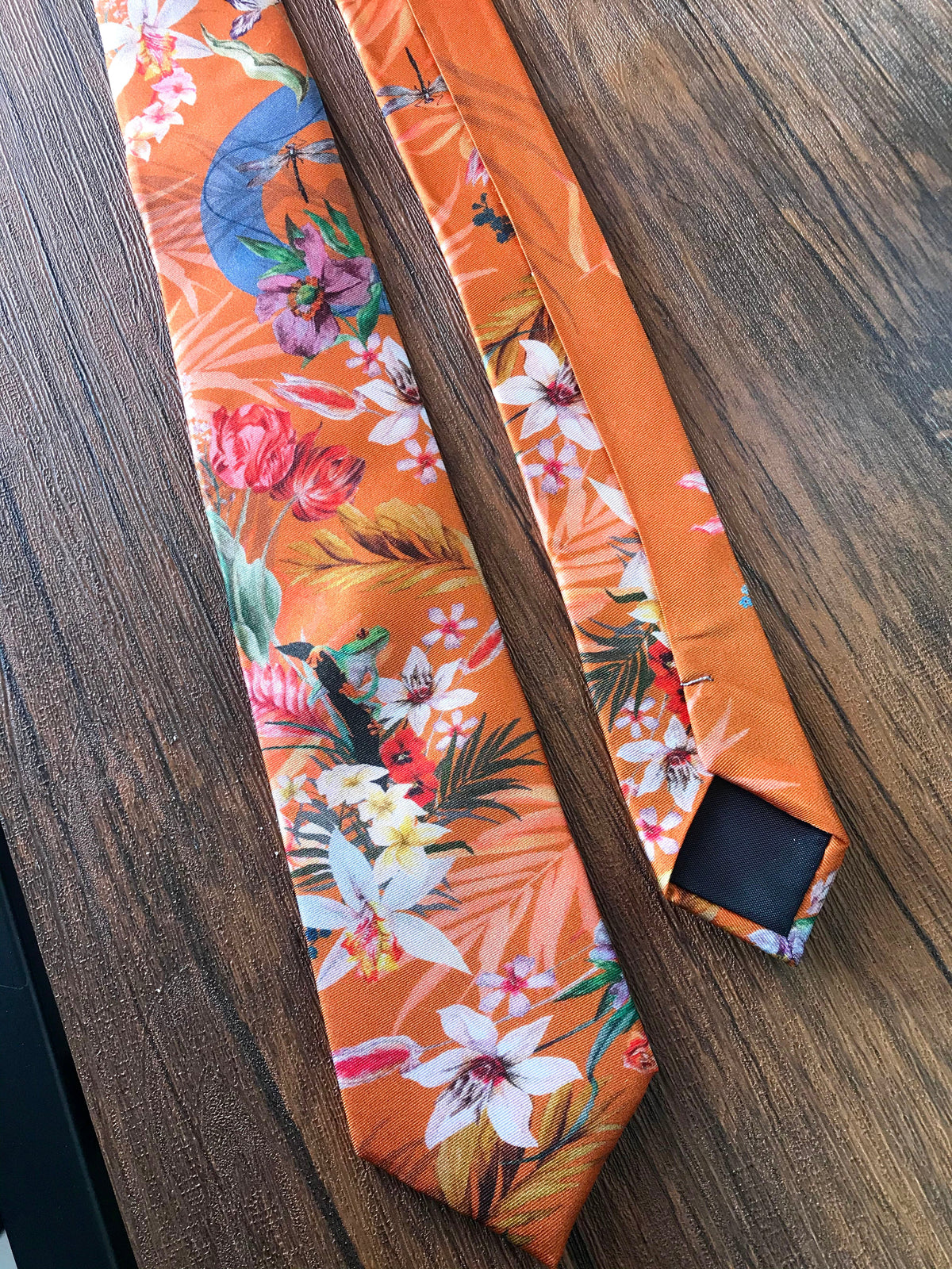 Rust orange coloured Silk Tie, 'Eden' tropical meadow print