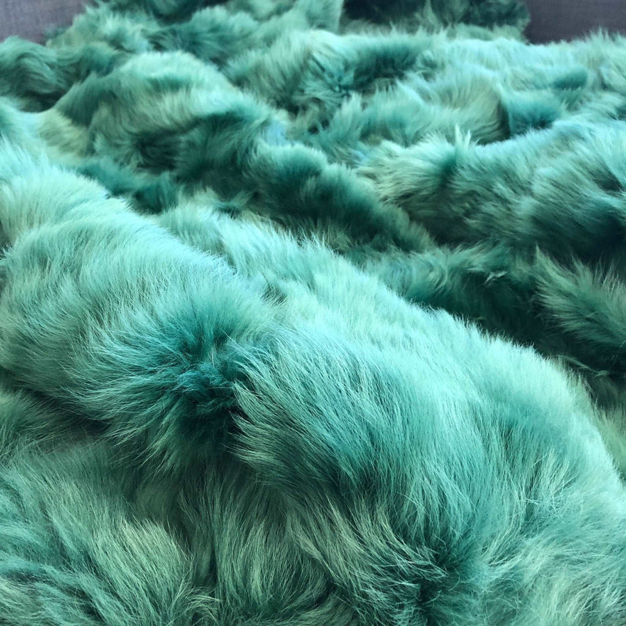 Premium Emerald Green Tuscan Shearling Throw, luxury handcrafted sheepskin rug, stylish deep green Toscana shearling, best-selling home decor by Wildash London at brixbailey.com