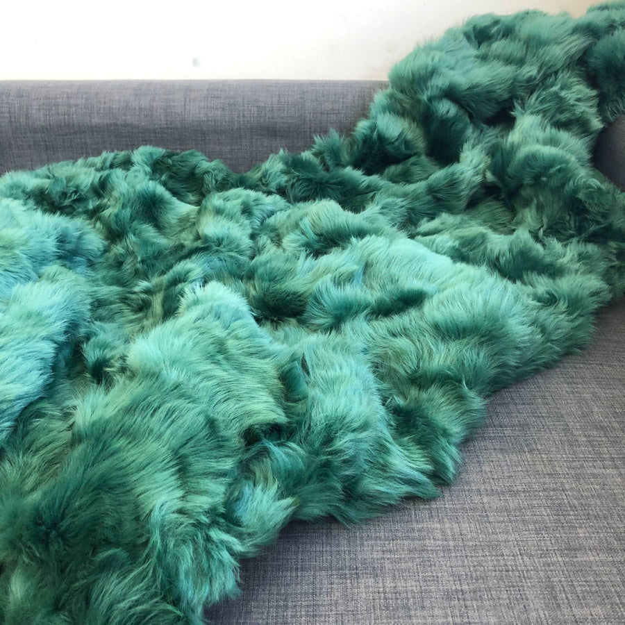 Premium Emerald Green Tuscan Shearling Throw, luxury handcrafted sheepskin rug, stylish sustainable home decor, best-selling soft shearling by Wildash London at brixbailey.com