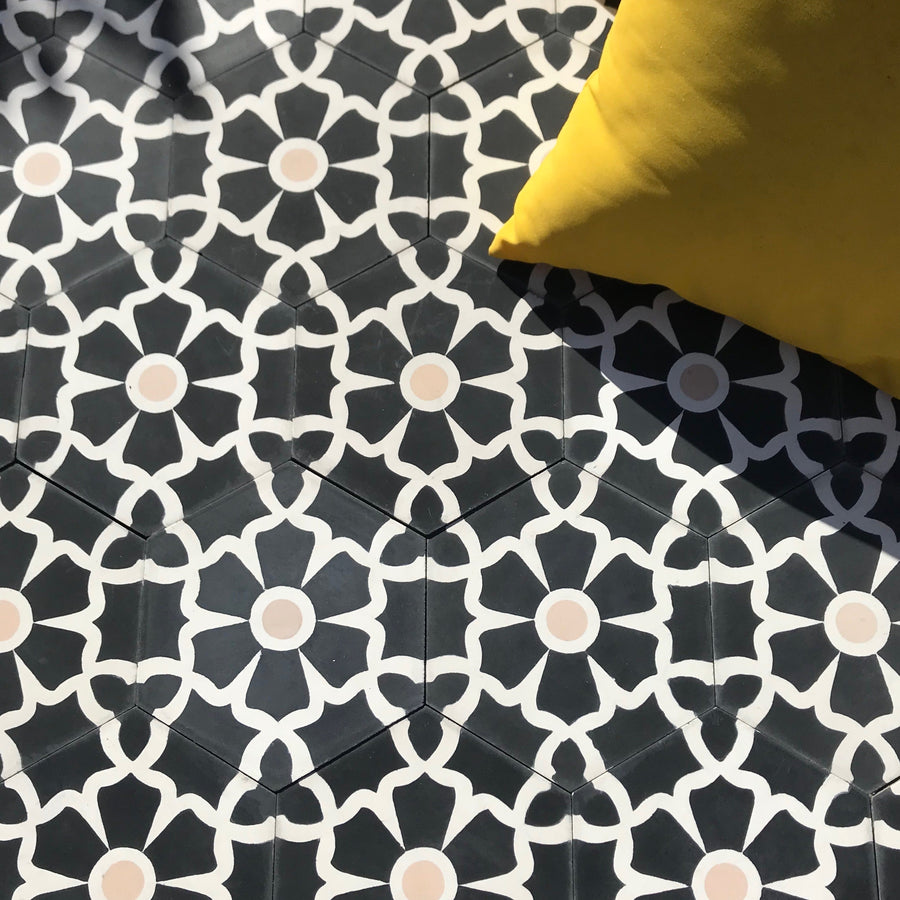 Luxury black cement floor tile, elegant white floral pattern, premium hexagon kitchen and bathroom tiles, best-selling UK delivery by Maria Starling Design at brixbailey.com