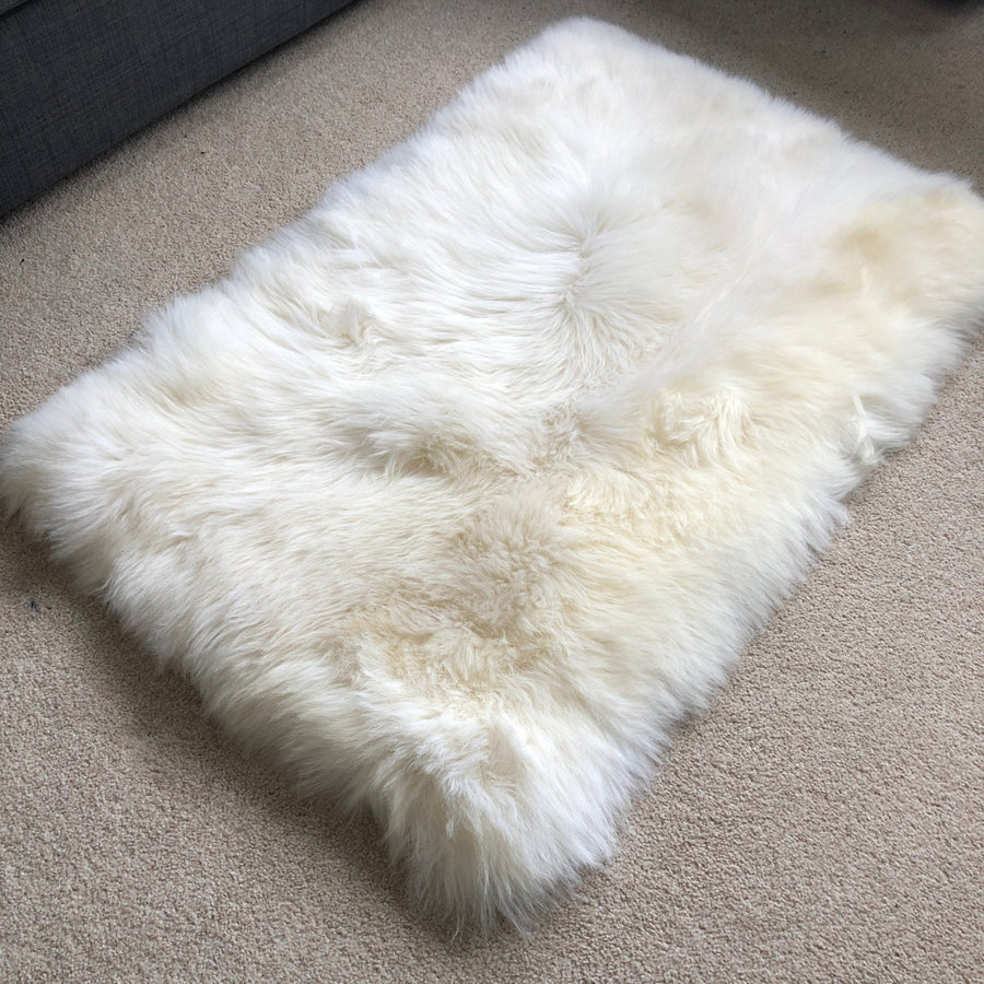 Premium British Sheepskin Rug, Luxurious Ivory Cream White Fur Throw, Soft Plush Rectangular 55cm x 85cm, Handcrafted Sustainable Free-Range Hide by Wildash London at brixbailey.com
