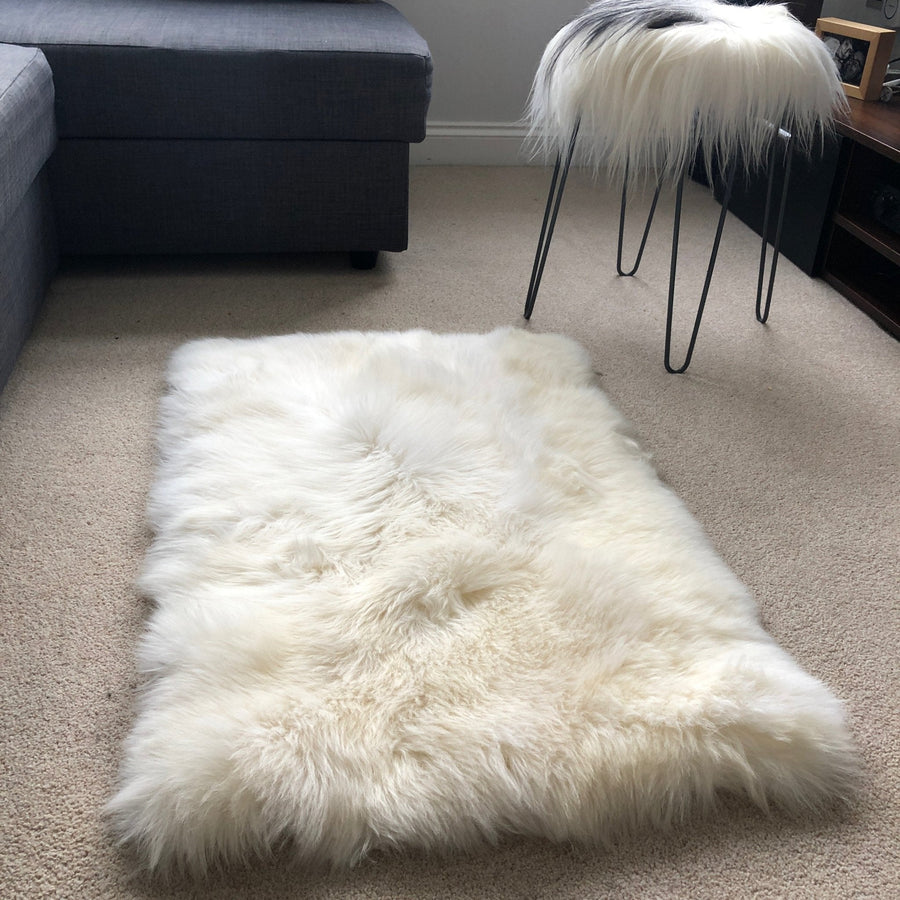 Premium British Sheepskin Rug, Luxurious Soft White Fur Throw, Handcrafted Rectangular 55cm x 85cm, Ivory Cream Straight Edges, Sustainable Organic by Wildash London at brixbailey.com