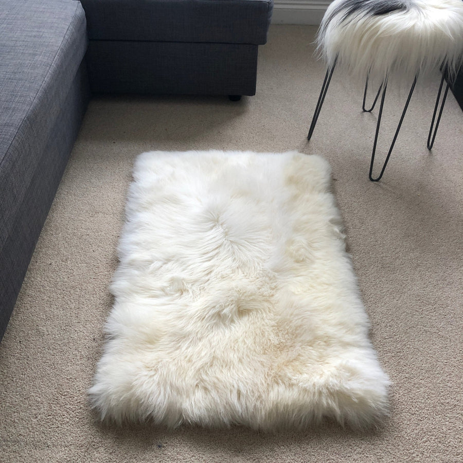 Premium British Sheepskin Rug, Luxurious Soft White Fur Throw, Handcrafted Rectangular 55cm x 85cm, Ivory Cream Straight Edges by Wildash London at brixbailey.com