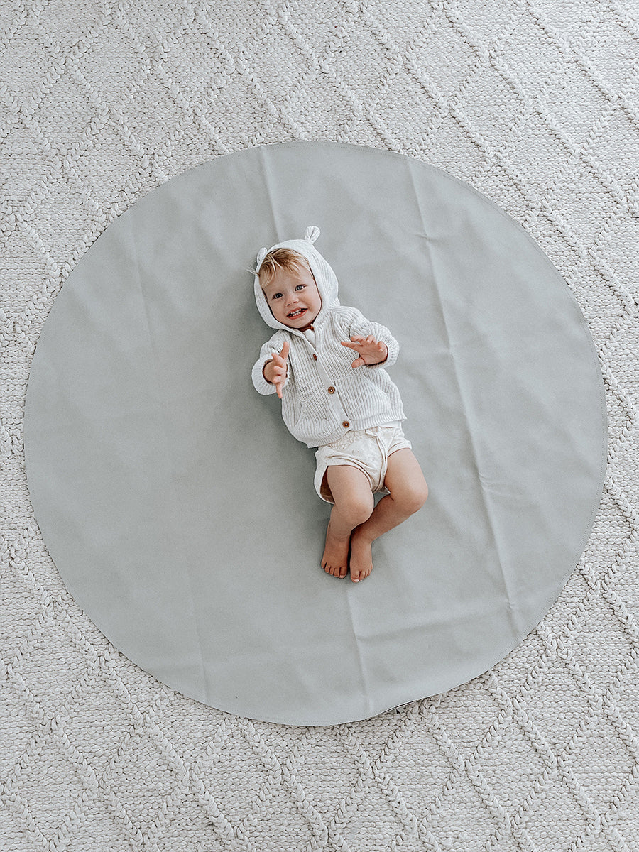 Luxury vegan leather maxi circle mat, portable and stylish for beach, park, or home, water-resistant with suede bottom and hanging strap. by Faemli at brixbailey.com