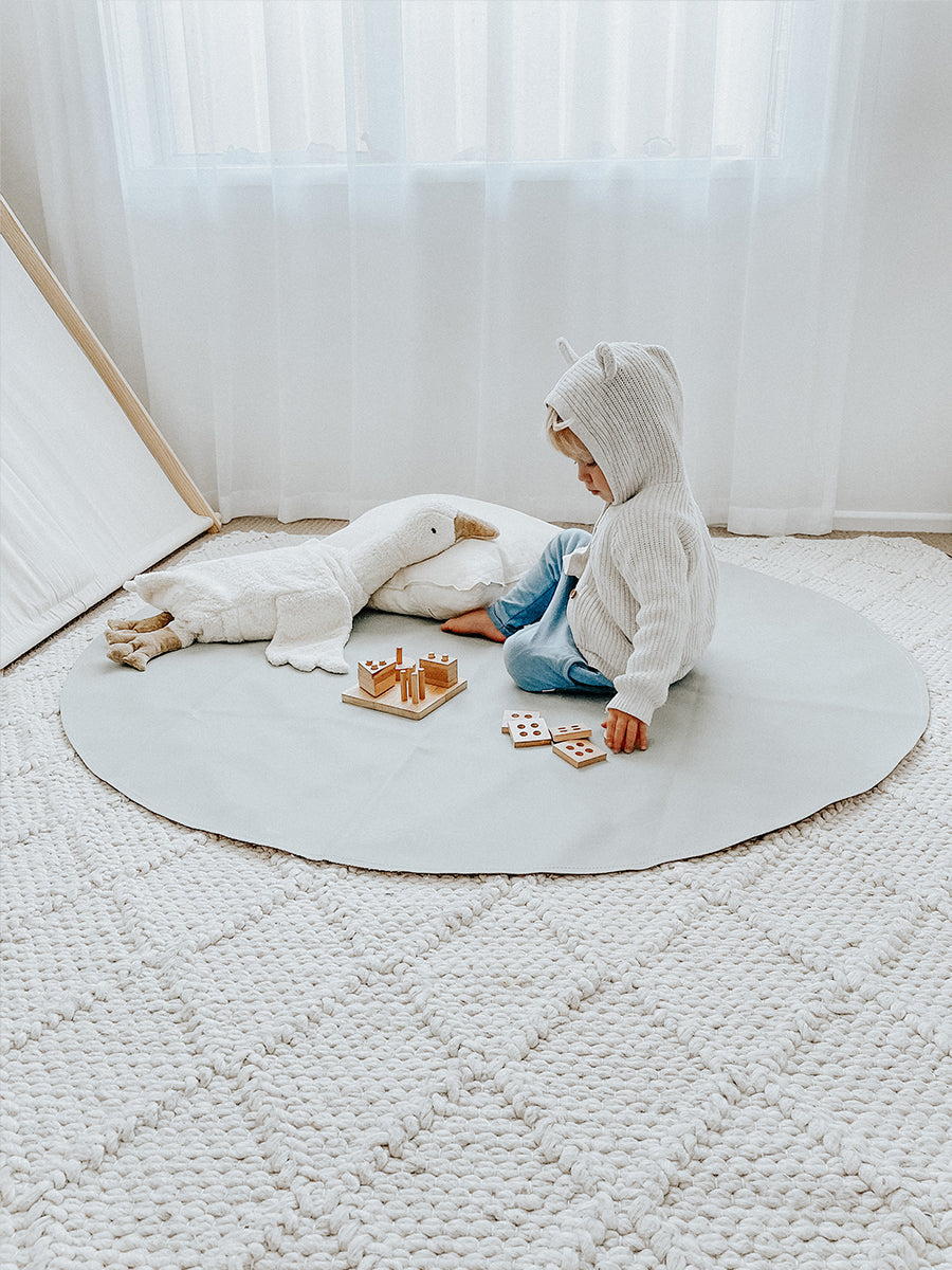 Premium vegan leather maxi circle mat, portable and stylish for beach, park, or home use, water-resistant with suede bottom by Faemli at brixbailey.com