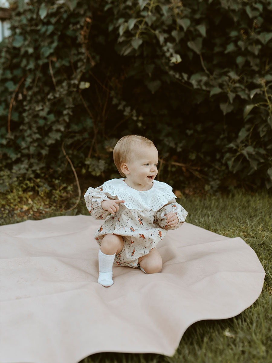 Premium vegan leather maxi circle mat, buttery soft with flocked suede bottom, portable for beach or home, water-resistant and wipeable by Faemli at brixbailey.com