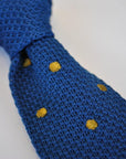navy blue skinny knitted tie with brown polka dots