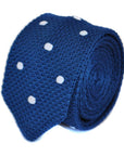 navy blue skinny knitted tie with white polka dots and pointed end