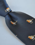 navy  tie with embroidered robin design