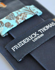 navy  tie with embroidered robin design