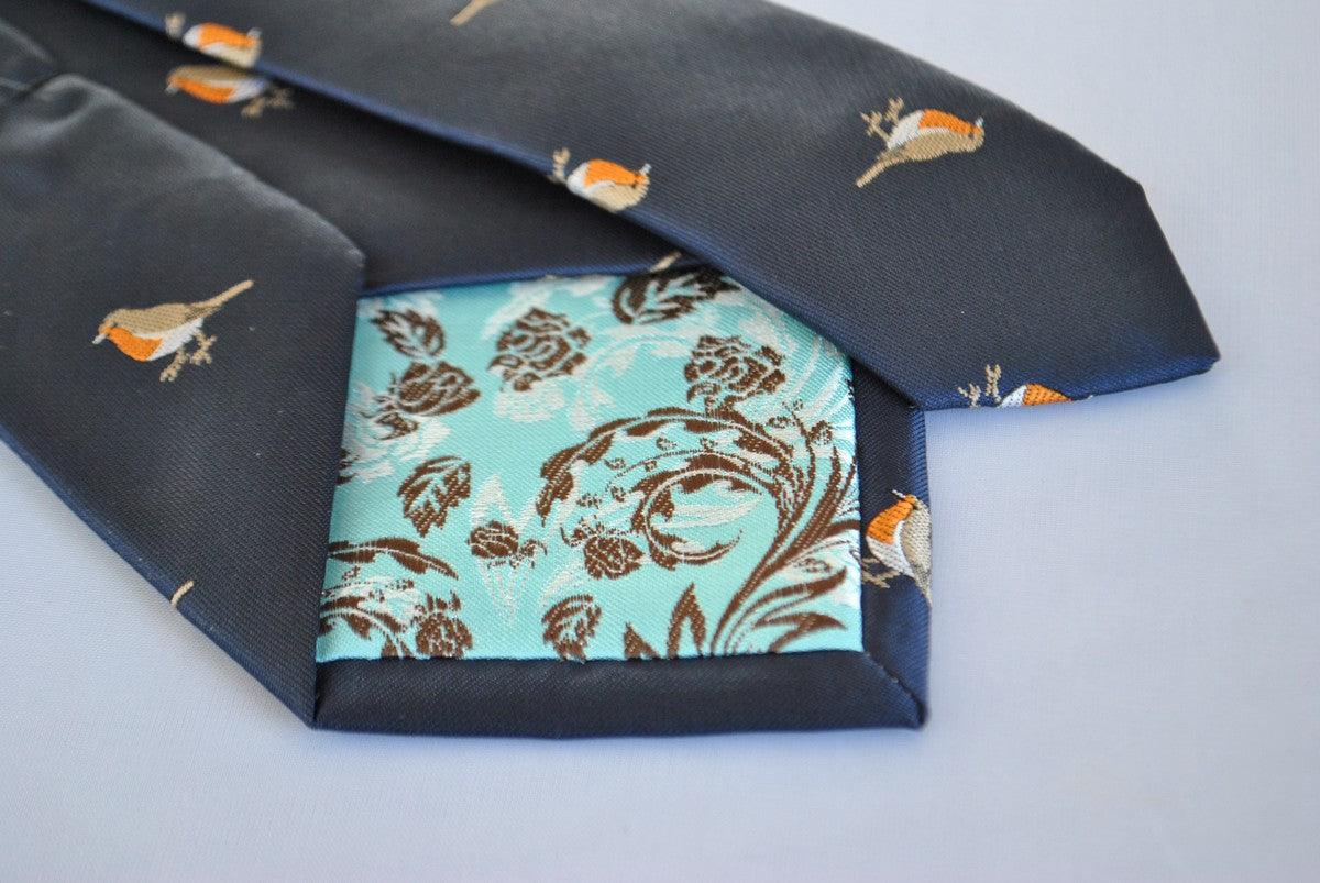 navy  tie with embroidered robin design