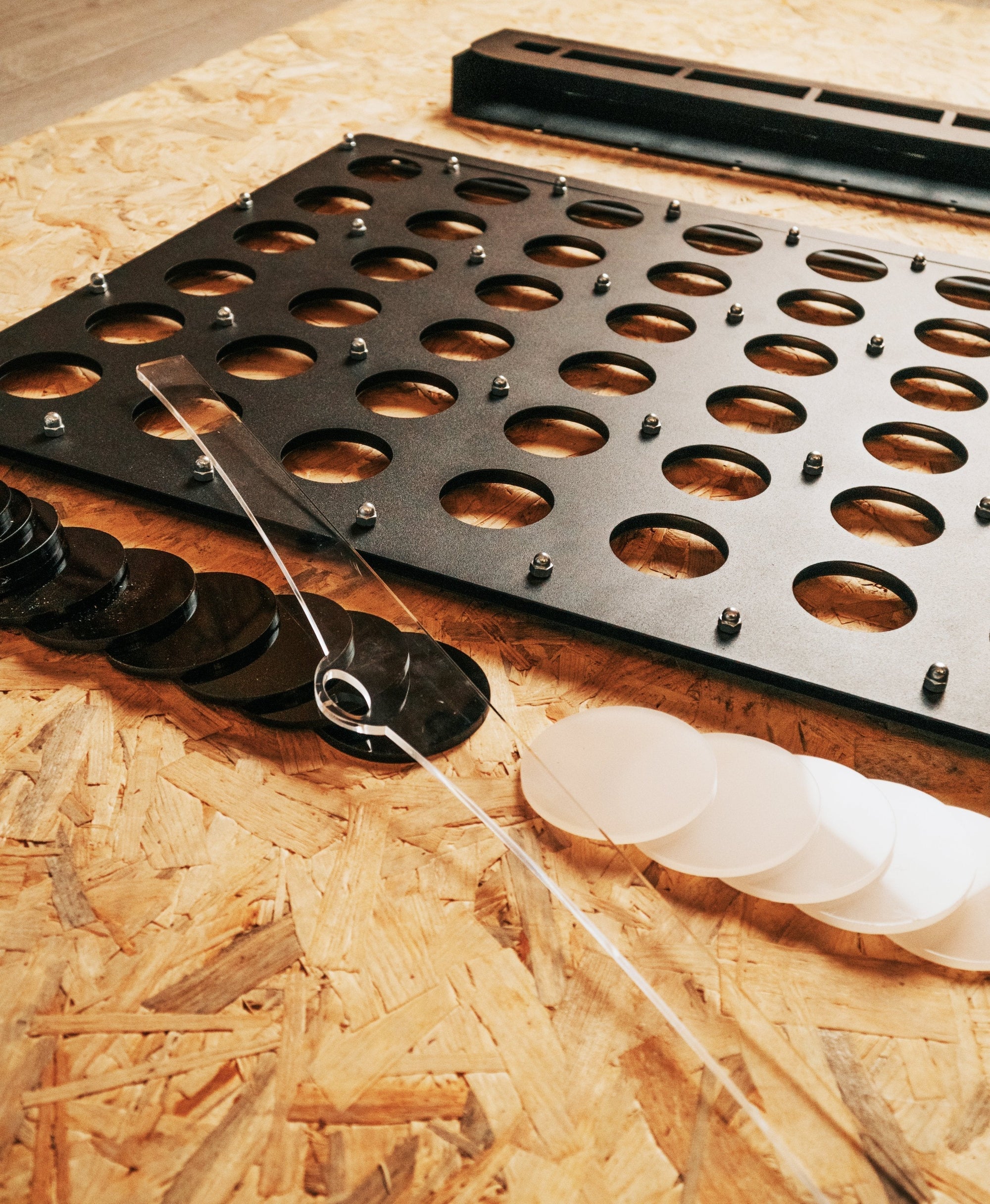 Connect 4 board stopper piece