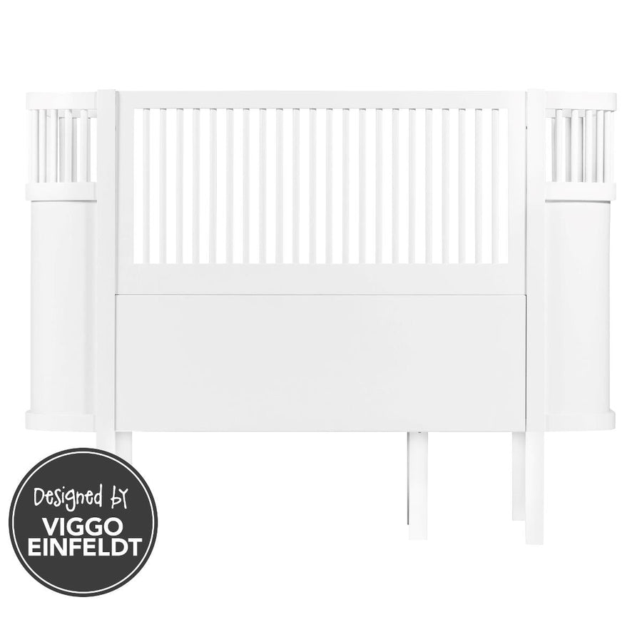 Premium white Sebra baby and junior cot bed, luxury handcrafted beech wood, adjustable mattress, non-toxic paint, best-selling by Ella James at brixbailey.com