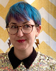 Gold and leopard lightning bolt earrings