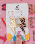 Gold and leopard lightning bolt earrings