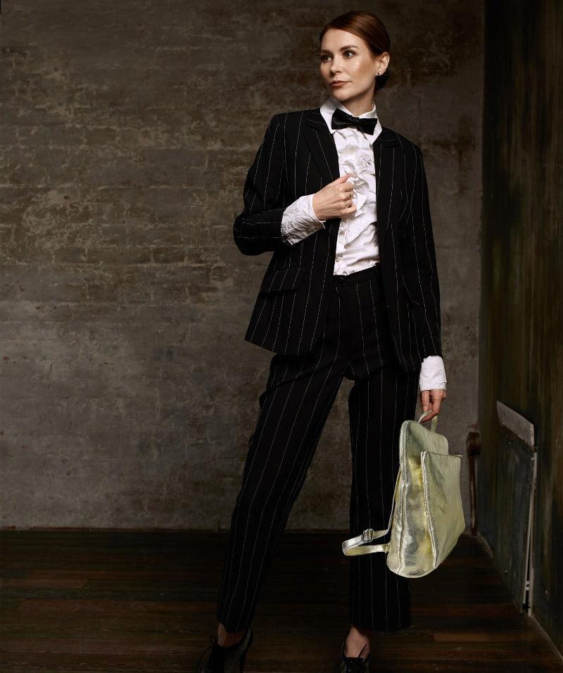 Gold Metallic Leather Backpack – Versatile & Elegant Design by Sostter at brixbailey.com