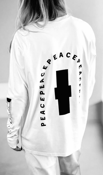 Premium relaxed fit white long sleeve with matte black graphics, 200 gsm organic cotton, handprinted limited edition by WWOOLLFF CO. at brixbailey.com