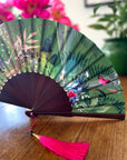 Green hand-held silk fan with 'Greenery' mushroom and crystal botanical artwork