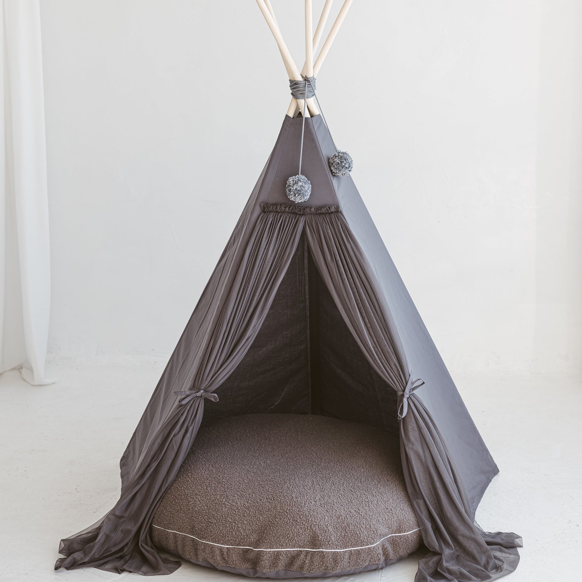 The MINICAMP Bouclé Fabric Kids Floor Cushion in Grey - Cozy &amp; Stylish Playtime Essential by Minicamp at brixbailey.com