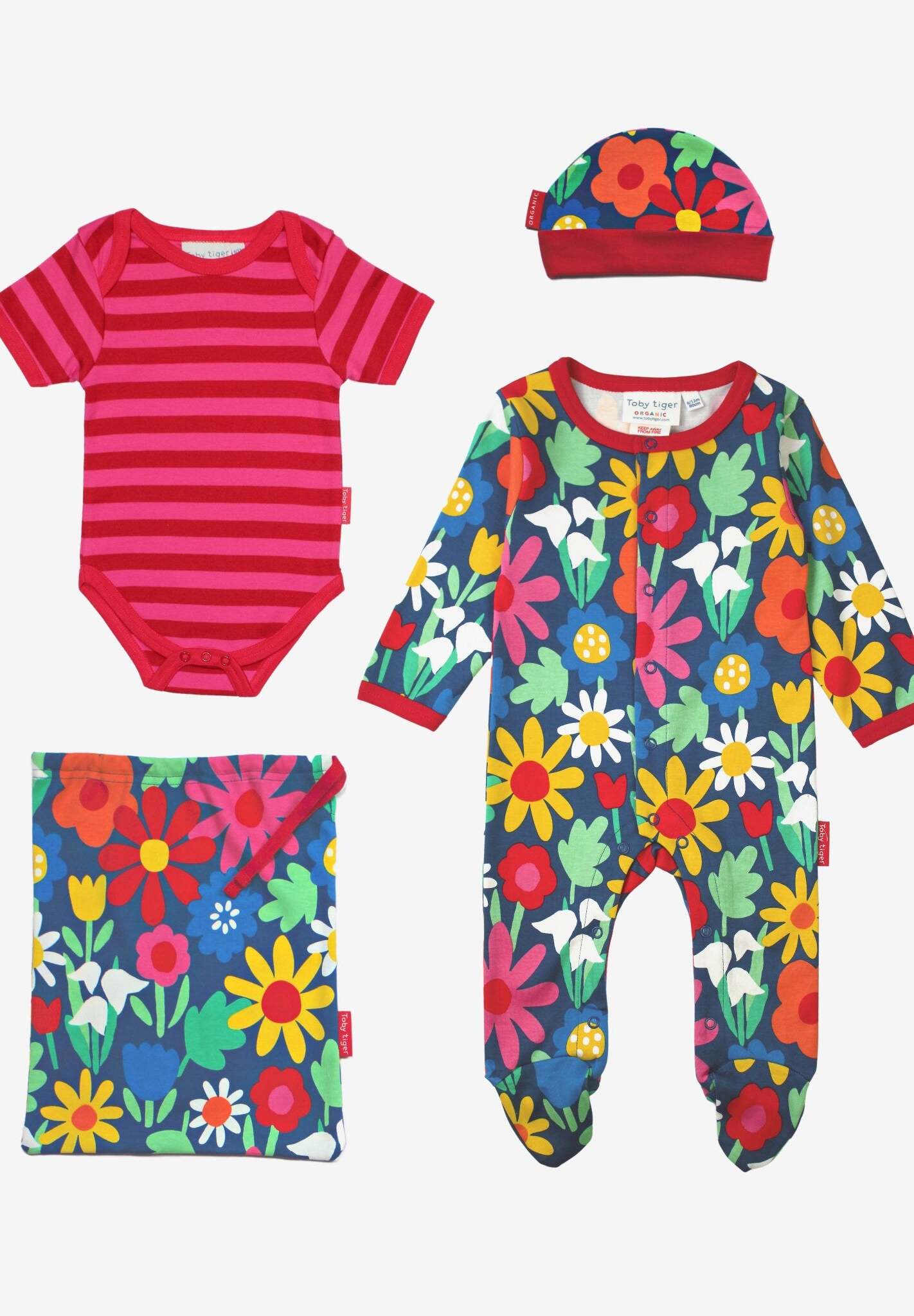 Luxury Bold Floral Baby Gift Set with Hat, Bodysuit, Romper, and Bag in Dark Blue by Toby Tiger at brixbailey.com