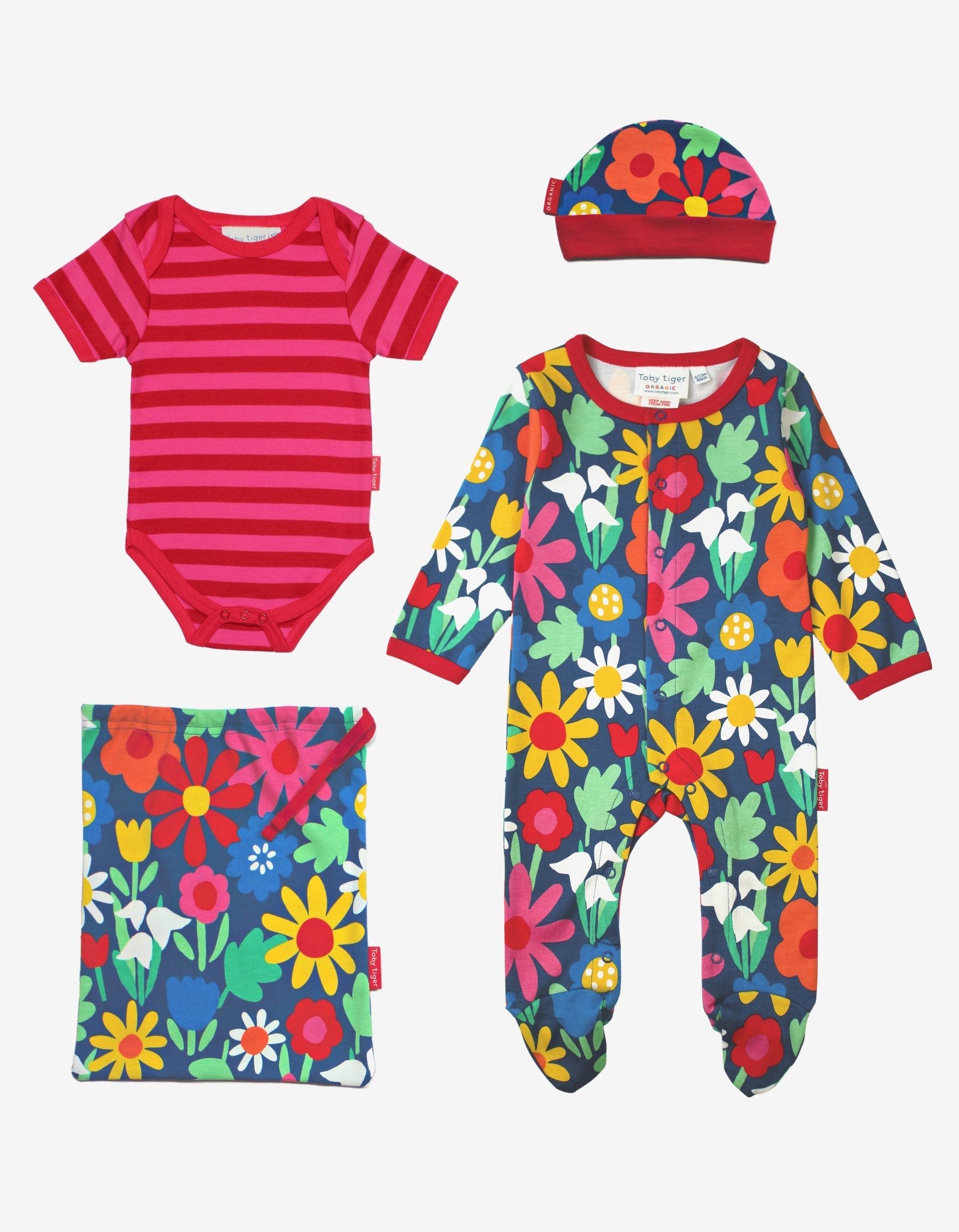 Premium Bold Floral Baby Gift Set with Hat, Bodysuit, Romper, and Tote in Dark Blue, Organic Cotton, Stylish and Comfortable by Toby Tiger at brixbailey.com