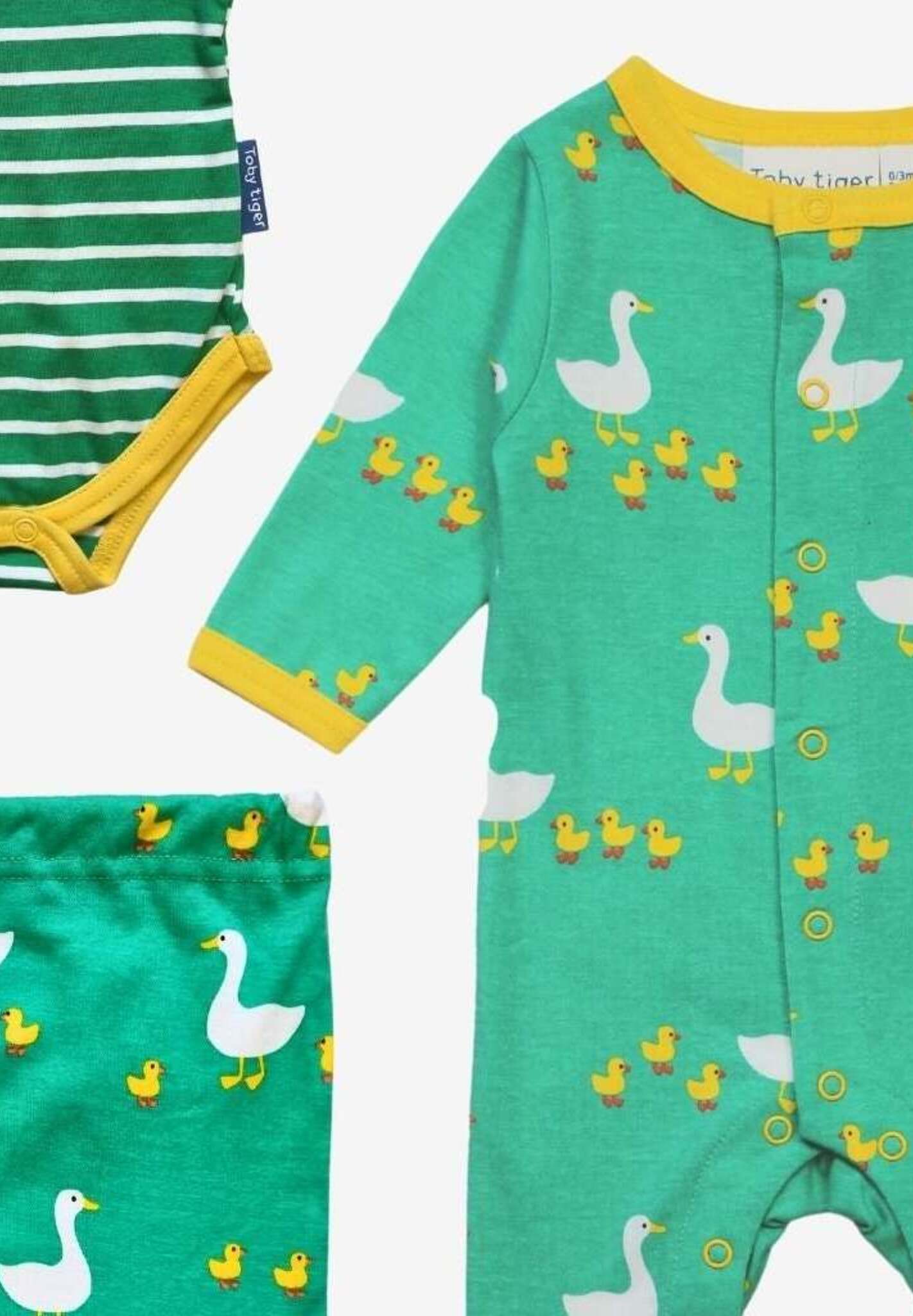 Premium Organic Baby Gift Set with Duck Design, Sleepsuit, Hat, Muslin, and Striped Bodysuit in Soft Eco-Friendly Cotton by Toby Tiger at brixbailey.com