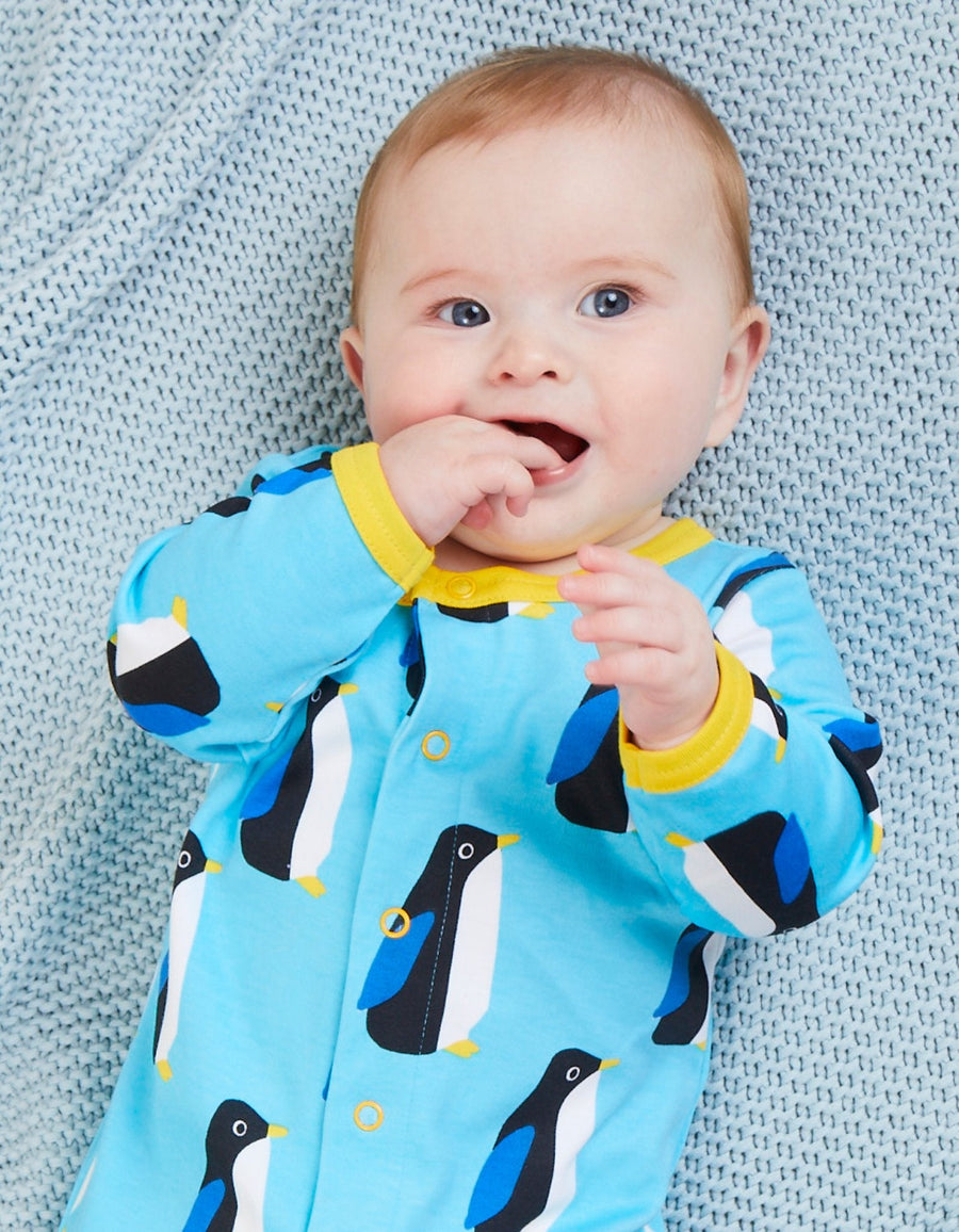 Premium Organic Baby Clothes Set with Penguin Print Onesie, Hat, and Bag - Soft GOTS-Certified Cotton for Ultimate Comfort by Toby Tiger at brixbailey.com