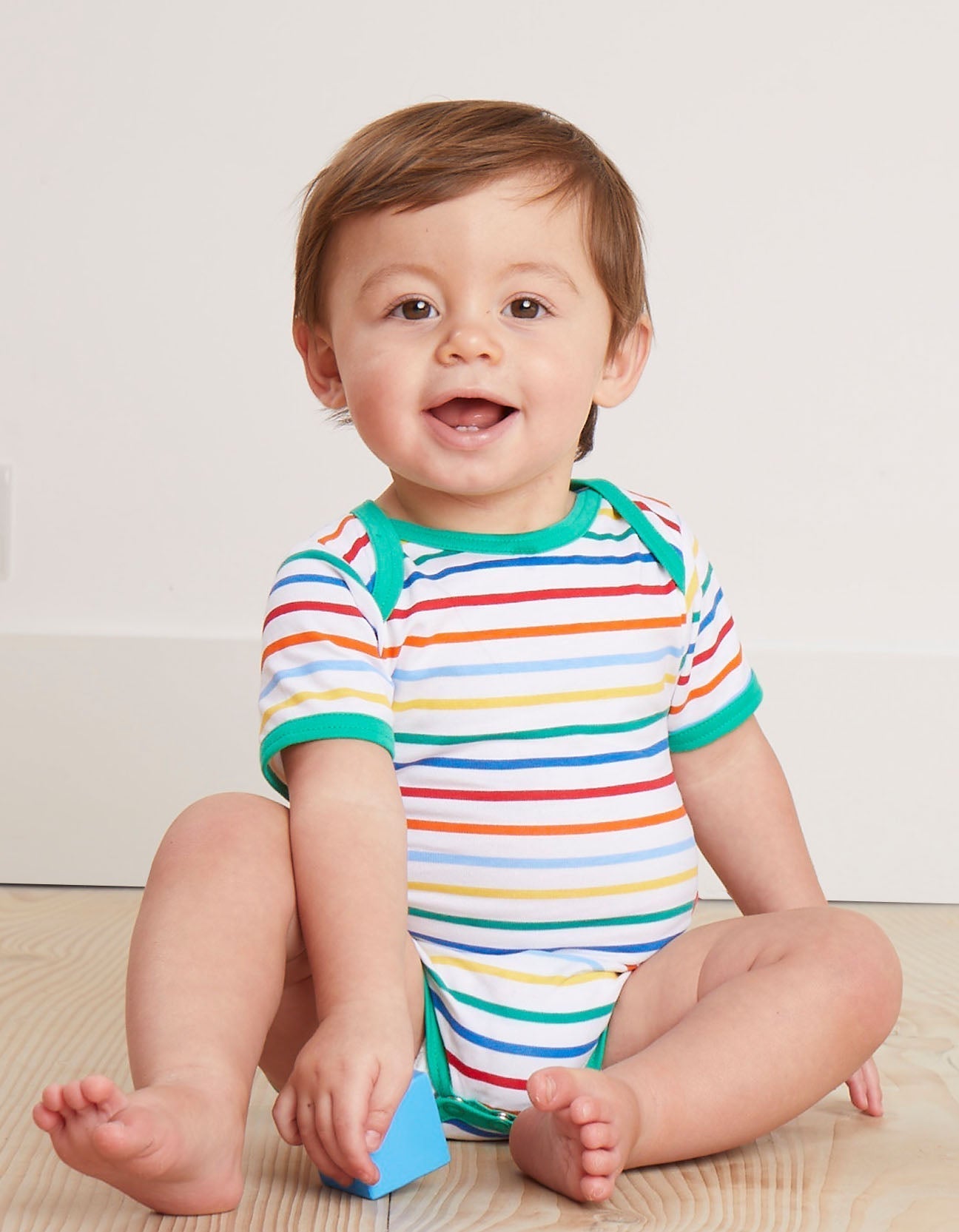 Premium Organic Cotton Baby Gift Set with Rainbow Print Hat, Onesie, and Romper - GOTS Certified and Eco-Friendly by Toby Tiger at brixbailey.com
