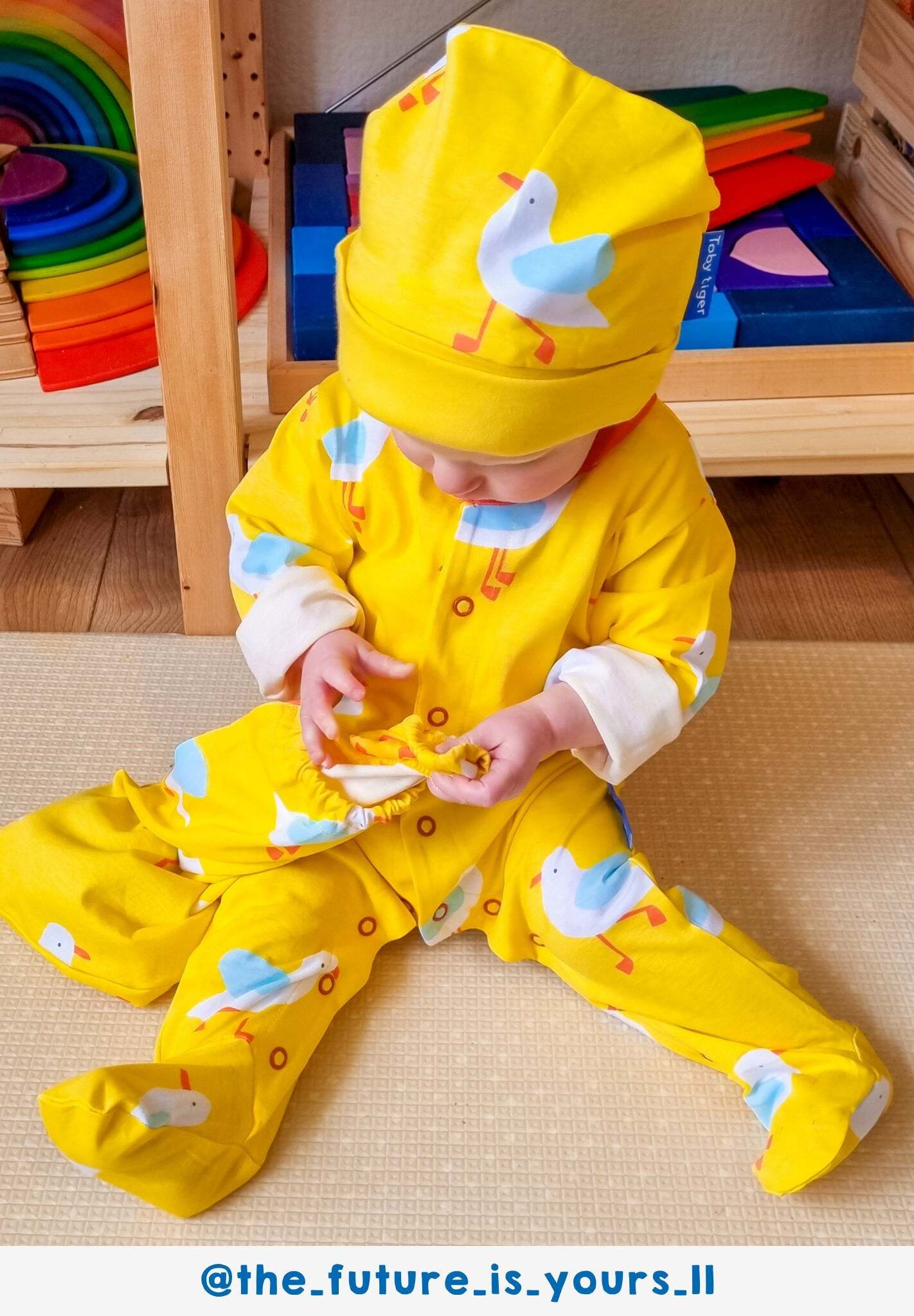 Premium organic cotton baby gift set with seagull print, yellow sleepwear, hat, bodysuit, drawstring bag by Toby Tiger at brixbailey.com