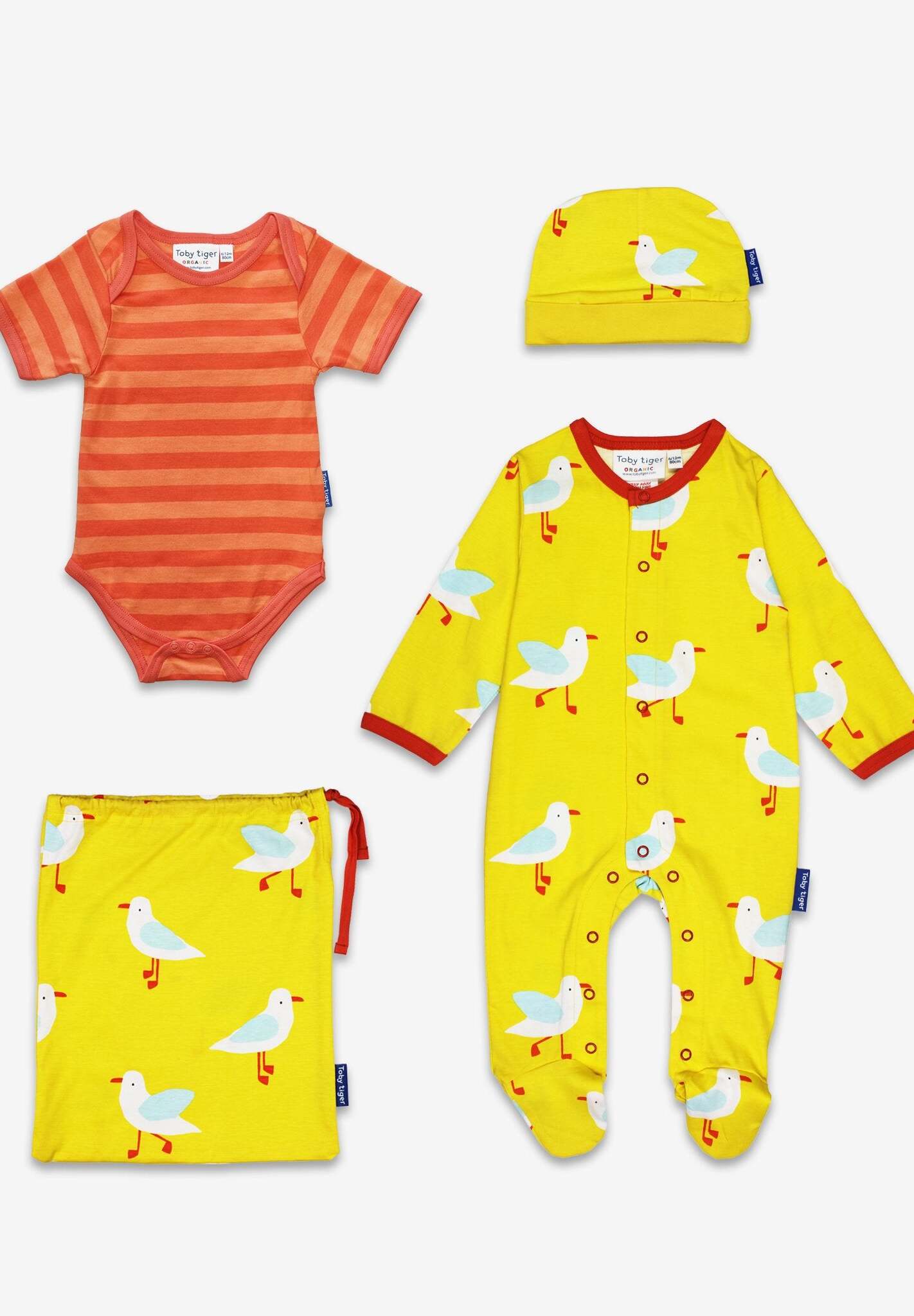 Premium organic cotton baby gift set with seagull print, cozy sleepsuit, hat, bodysuit, stylish drawstring bag by Toby Tiger at brixbailey.com