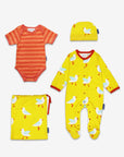 Premium organic cotton baby gift set with seagull print, yellow sleepwear, hat, bodysuit, stylish drawstring bag by Toby Tiger at brixbailey.com