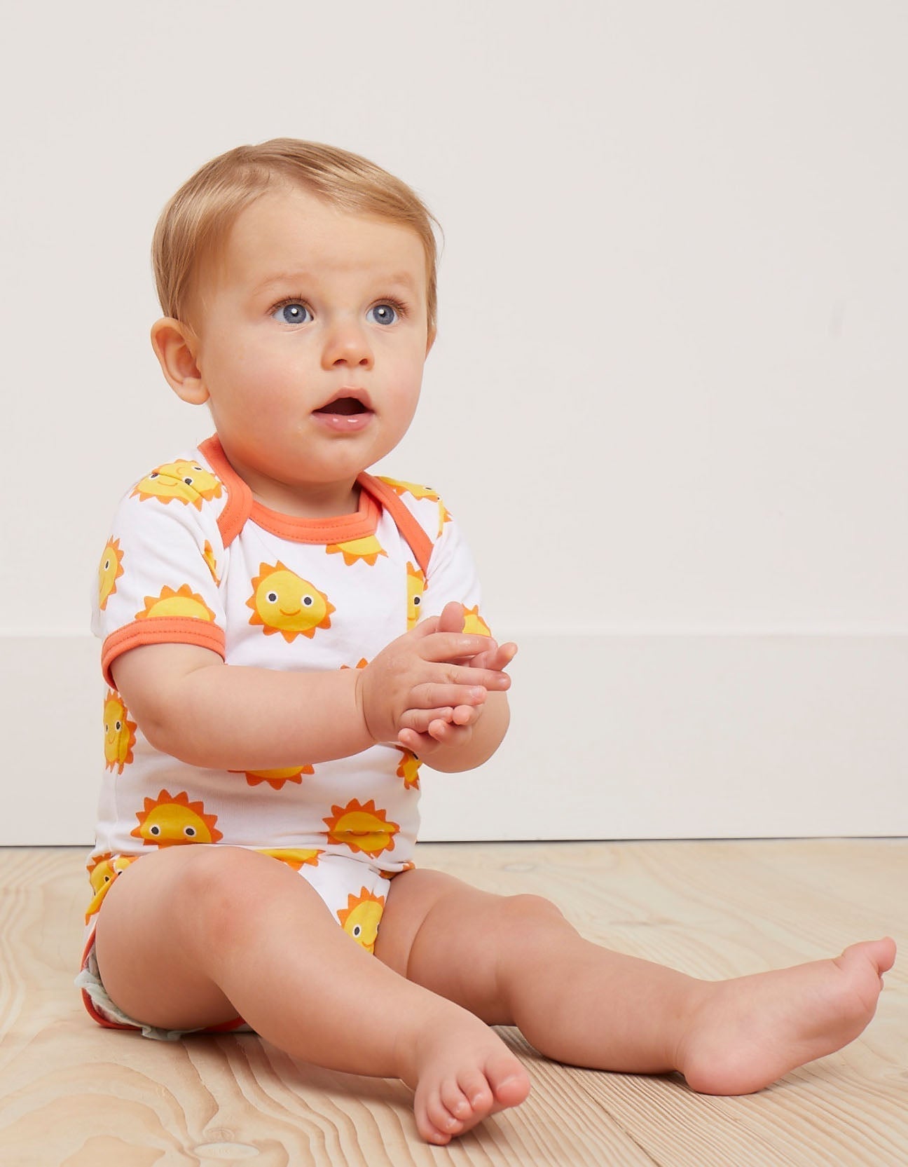 Premium Baby Gift Set with Hat, Romper, and Bodysuit in Soft GOTS-Certified Organic Cotton, Adorable Sun and Clouds Print by Toby Tiger at brixbailey.com