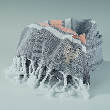 Luxury Hampton hammam towel, premium soft cotton, dark navy with orange and white stripe, handloomed in Turkey, quick-drying, absorbent, stylish yacht beach towel by Wildash London at brixbailey.com