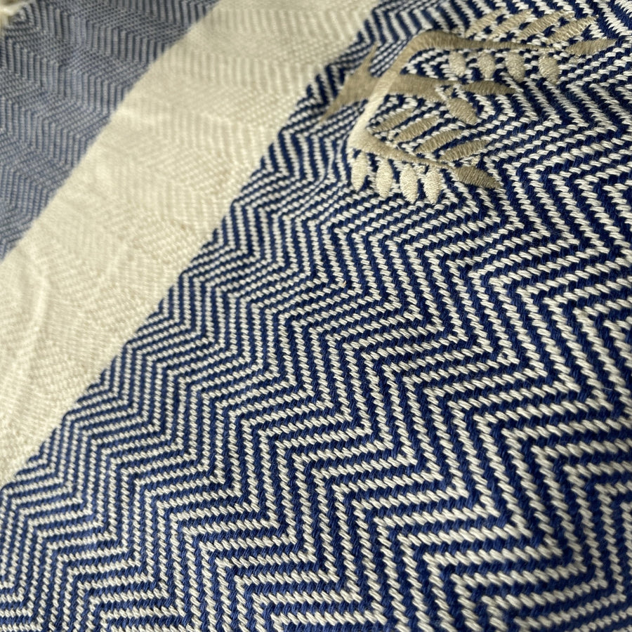 Luxury Harrington Bed Throw XL, premium oversized herringbone blanket in navy blue and natural organic cotton, handloomed, best-selling king size by Wildash London at brixbailey.com