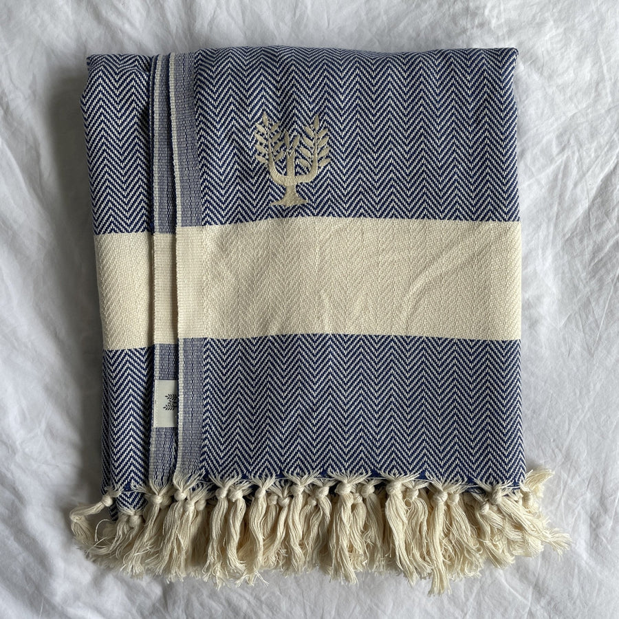 Luxury Harrington Bed Throw XL, premium oversized organic cotton blanket, navy blue herringbone design, handloomed, best-selling king size throw by Wildash London at brixbailey.com
