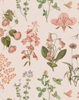 soft pastel green and salmon floral wallpaper for a serene kids room
