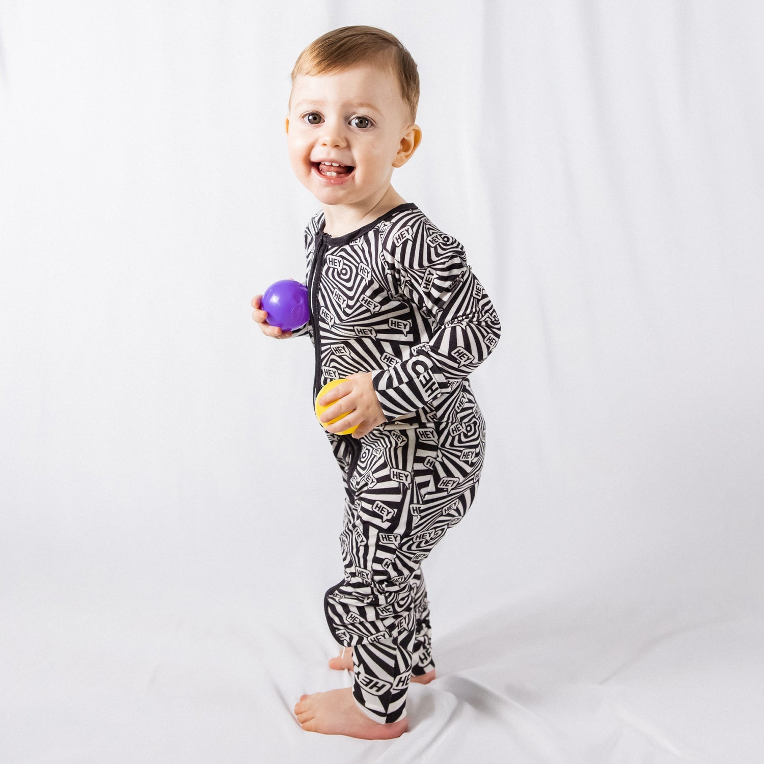 High Contrast Print Bamboo Zip Onesie - Soft & Stretchy for Baby Comfort & Development by NIXX BABY at brixbailey.com