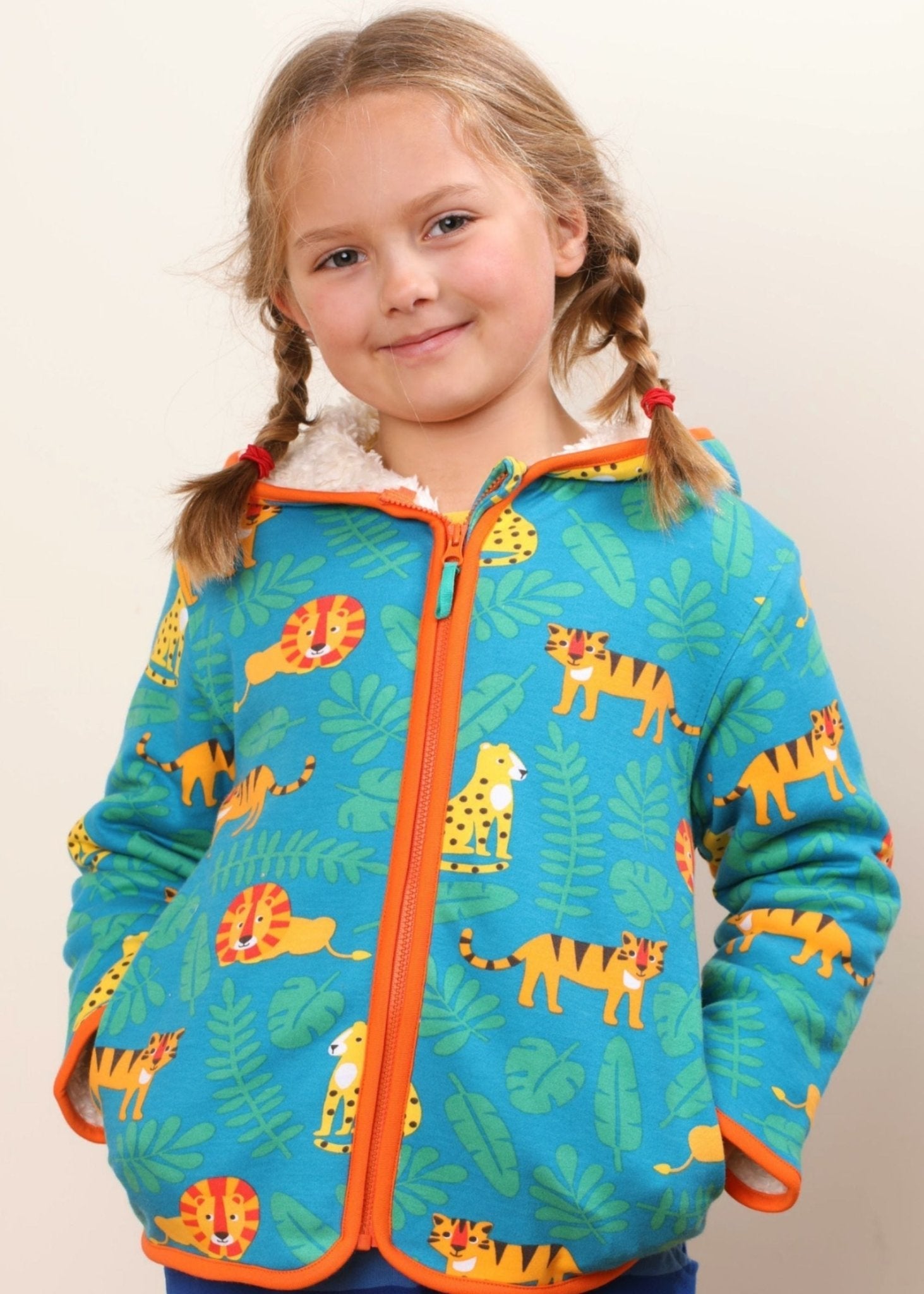 Premium Soft Organic Cotton Baby Hoodie with Cozy Fleece Lining and Hood by Toby Tiger at brixbailey.com