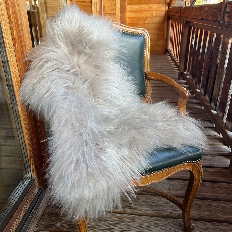 Premium Icelandic sheepskin throw in dove grey, luxury long-haired ethically sourced sheepskin rug, handcrafted and hypoallergenic by Wildash London at brixbailey.com