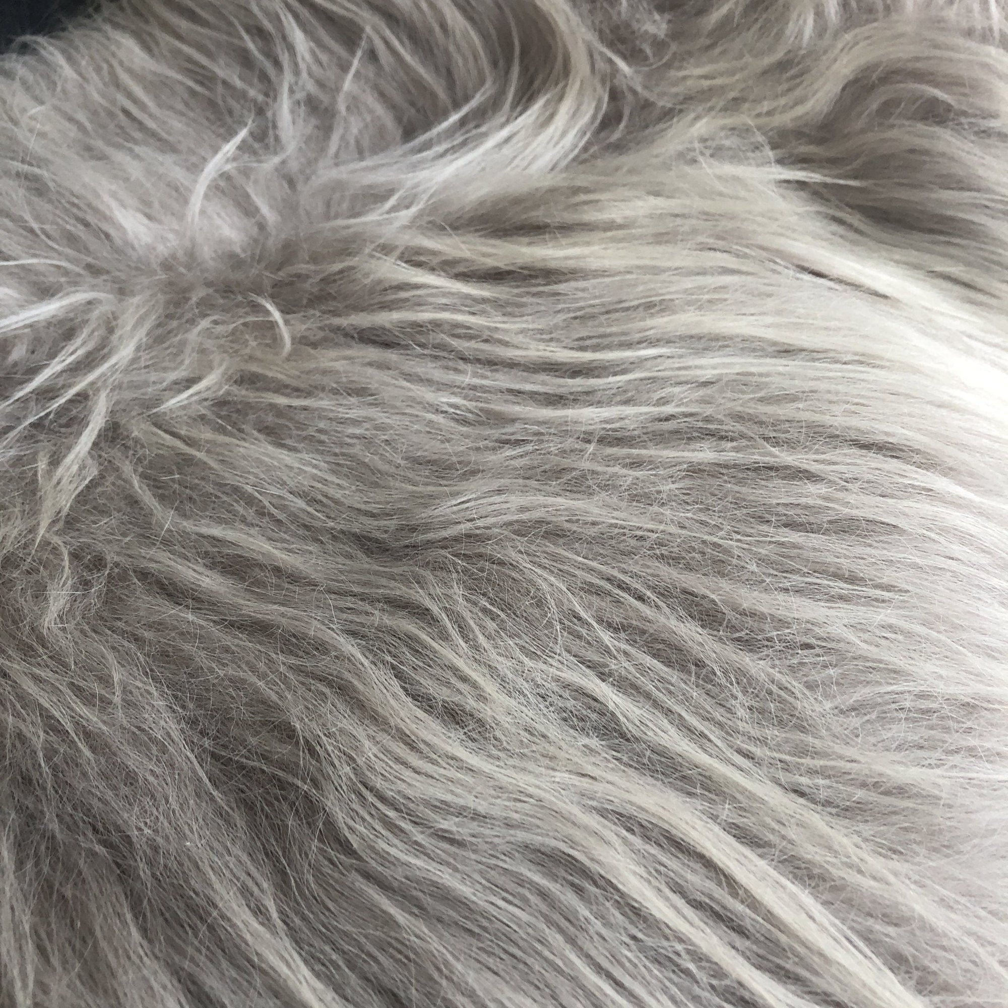 Luxury Icelandic longhair sheepskin throw in dove grey, premium ethically sourced free-range sheepskin rug, best-selling sustainable home decor by Wildash London at brixbailey.com